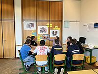 Impressionen von der Veranstaltung \"Wer repariert eigentlich unsere Welt\" vom 12. März 2026