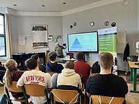 Impressionen von der Veranstaltung \"Wer repariert eigentlich unsere Welt\" vom 12. März 2026